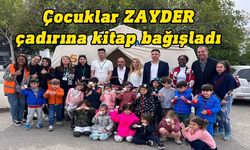 Çocuklar, Gönyeli Alayköy Belediyesi park yerindeki ZAYDER çadırına kitap bağışladı